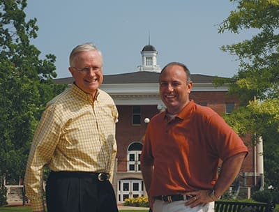 Bill Greer (right) enjoys a sunny day on campus with Don Jeanes,  who preceded him as president of Milligan College.