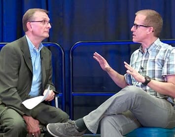 Mark A. Taylor (left) interviews Gene Appel.