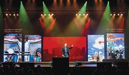 North American Christian Convention President Tim Harlow preaches on the opening night of the four-day gathering in Indianapolis on July 8.
