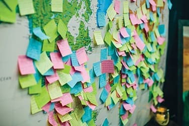 A prayer room in the middle of the exhibit hall included themed prayer stations and also this prayer map, where people attached prayers and concerns for individuals and people groups around the world. A smaller, more intimate prayer room set up in an adjoining hotel was open around the clock.