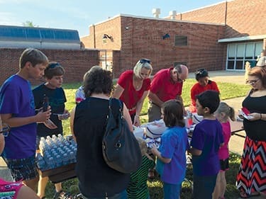 Volunteers from Grandview Christian Church participate in a beginning-of-the-school-year event at South Side Elementary in Johnson City, TN.