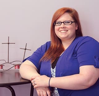 Amber went through the group home and foster care programs at Open Arms, was adopted, then went to college, and is now back with Open Arms where she works as a foster care case manager.