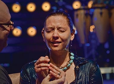A woman is baptized at Whitewater Crossing Christian Church, Cleves, OH. There were 124 baptisms at the church in 2015.