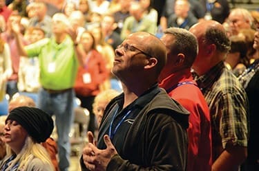 Attendees enjoy worship during ICOM's November 2016 event in Lexington, Kentucky.
